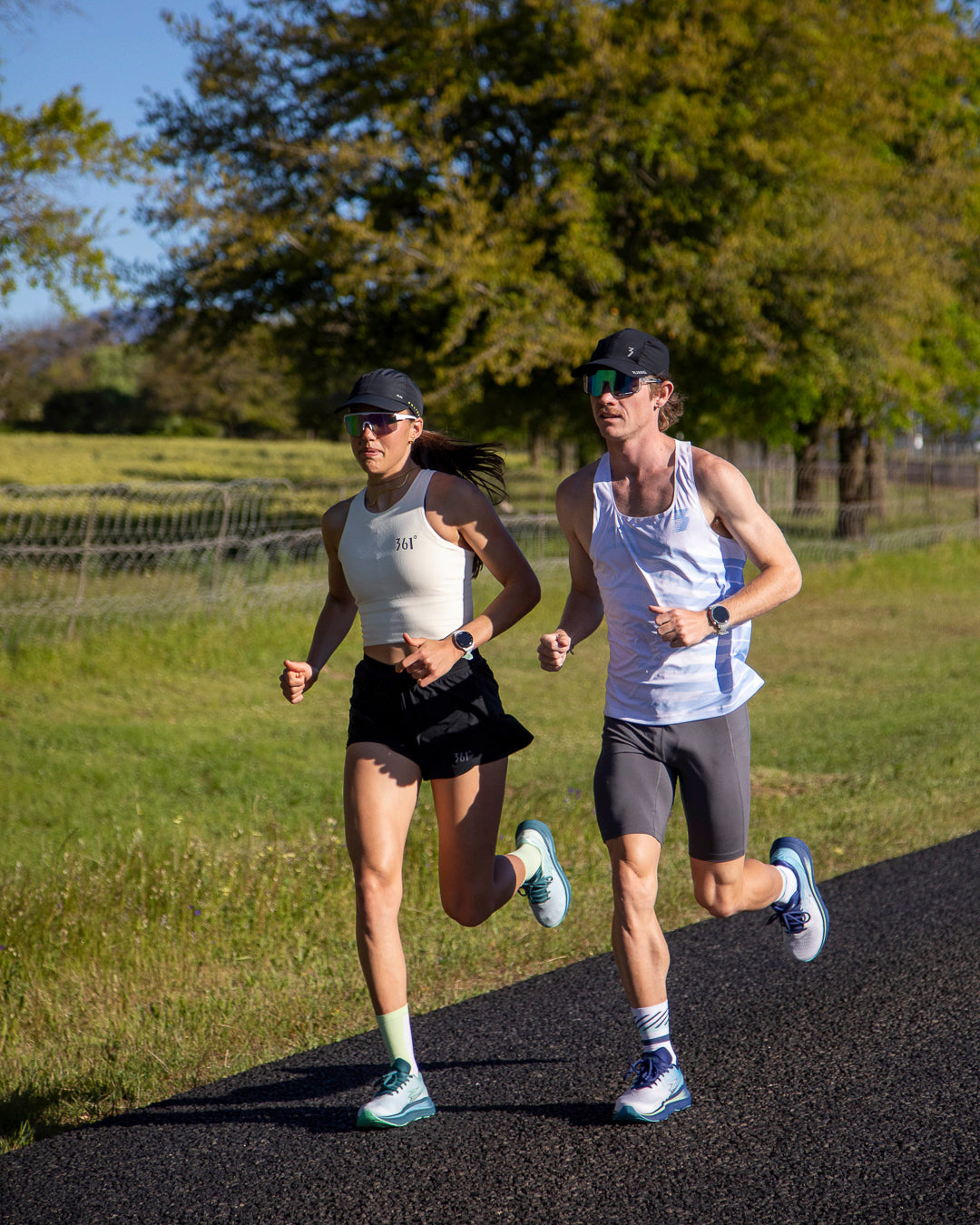 man and woman running in 361 meraki 7 neutral running shoes