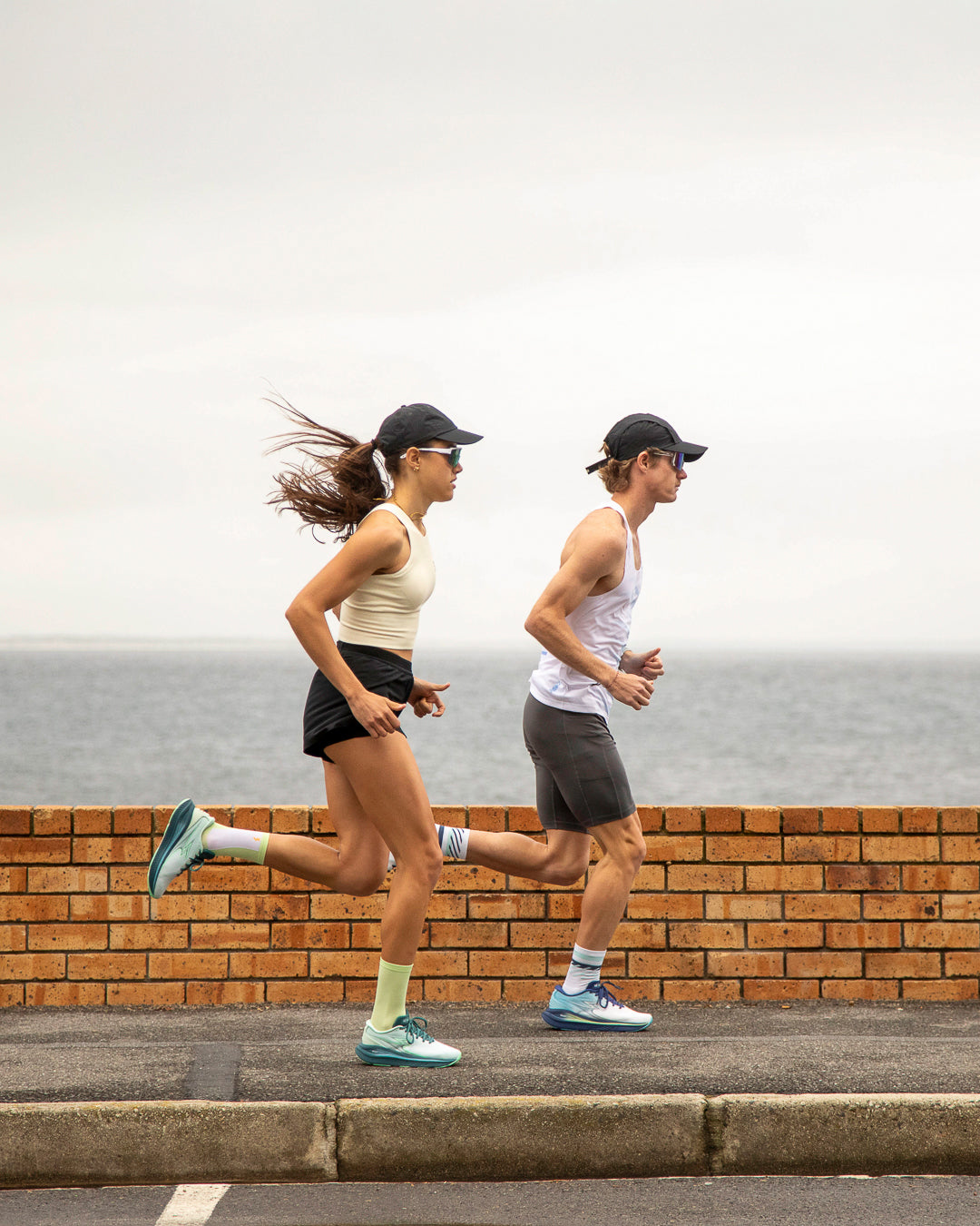 man and woman running in 361 meraki 7 neutral running shoes